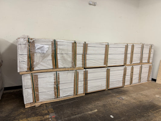 Stack of pallets with wooden crates in a warehouse setting